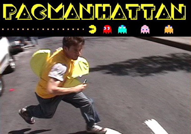 Figure 3 A Pac-Manhattan player dressed up as Pac-Man runs across a street to avoid ghost players. Image retrieved from http://pacmanhattan.com